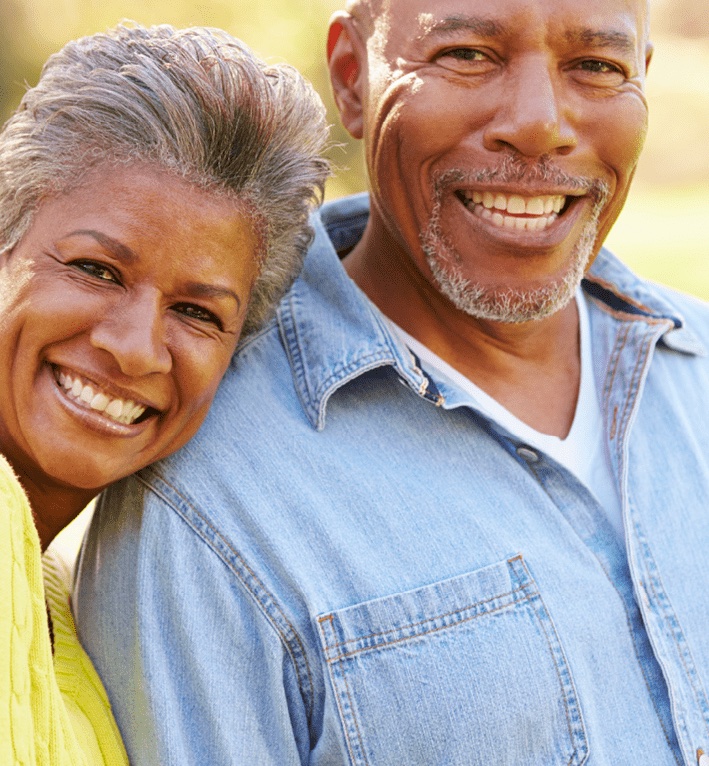 A smiling older couple